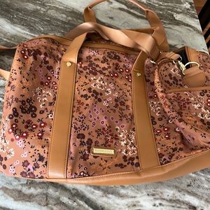 Madden Girl floral duffel bag with shoulder strap